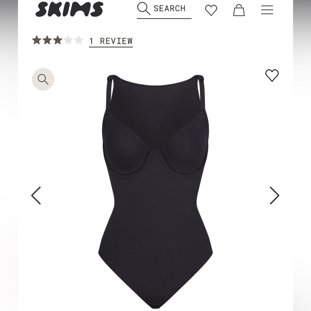 Skims Back Smoothing Body Suit. New with tags. Never worn